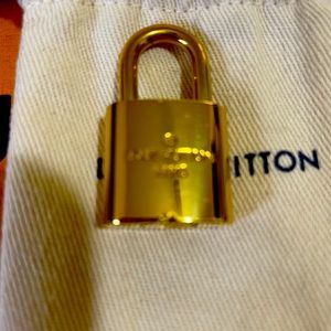 Louis vuitton gold lock